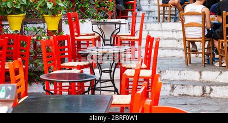 traditional Greek restaurant tables summer holiday concept Stock Photo