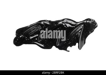 Clay or charcoal face mask stroke isolated on white Stock Photo