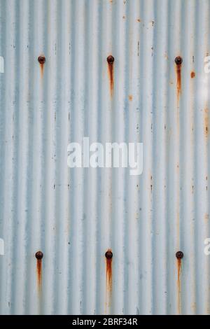 Blue gray wave metal sheet wall texture background Stock Photo