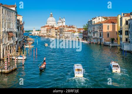 Venice - May 18, 2017: Nice panoramic view of the famous Grand Canal in Venice, Italy. It is one of the main tourist attractions of Venice. Cityscape Stock Photo