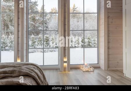 Bright photo studio interior with big window, high ceiling, white wooden floor Stock Photo