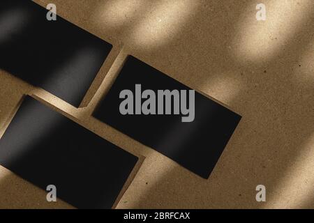 Black business cards on cork board table Stock Photo