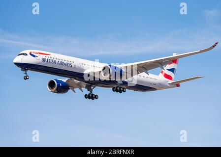 British Airways Airbus A350-1000 jet airliner plane on delivery landing at London Heathrow Airport over Cranford, London, UK during COVID-19 lockdown.