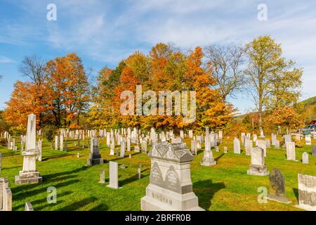 View of the Old Yard Center Cemetery behind the famous Stowe Community Church in Main Street, Stowe, Vermont, New England, USA Stock Photo