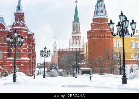 Moscow Kremlin at the Manege Square in winter, Russia. Central Moscow during snowfall. Manege (Manezhnaya) Square is one of main travel attractions of Stock Photo