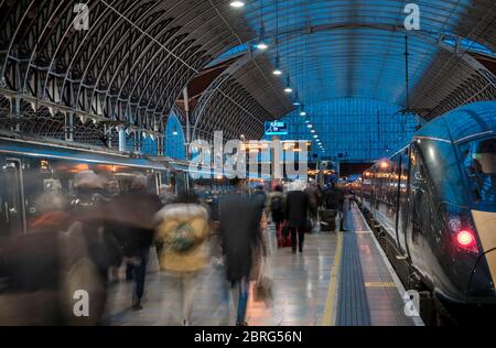 Great Western Railway Class 800 train waiting at a railway station platform at dusk in England, United Kingdom. Stock Photo