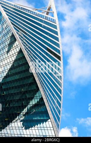 Moscow - Sep 10, 2017: Modern skyscraper in Moscow-City, Russia. Building with futuristic design. Moscow-City is a district with business and resident Stock Photo