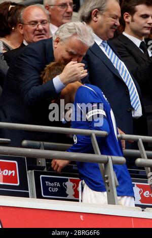 LONDON, UK MAY 30: Everton chairman Bill Kenwright consoles captain Phil Neville (Everton) at full-time during FA Cup Final between Chelsea and Everto Stock Photo