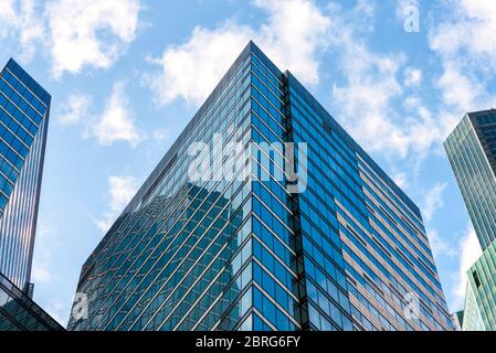 Moscow - Sep 10, 2017: Modern skyscrapers of Moscow-City. Top of new buildings against sky. Moscow-City is a business district and landmark of Moscow. Stock Photo