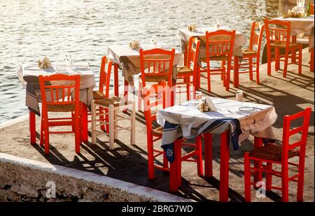 traditional Greek restaurant tables summer holiday concept Stock Photo