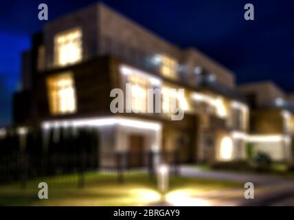 Townhouses in the night town, creative abstract blur background with bokeh effect Stock Photo