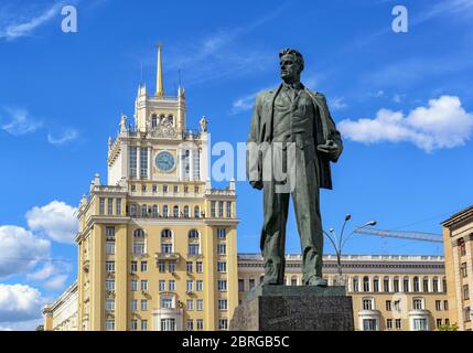 Monument to the Soviet poet Vladimir Mayakovsky and Hotel Beijing on Triumph Square. The monument was erected in 1958. Stock Photo