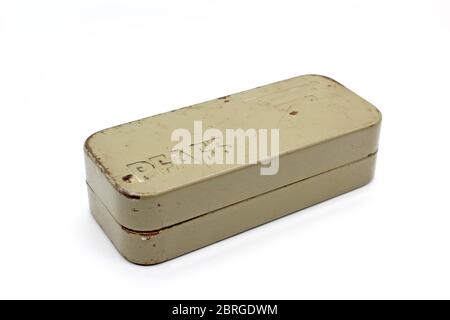 Antique metal box with Pfaff logo, isolated on a white background Stock Photo