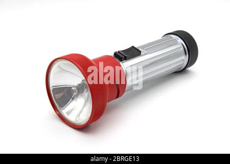 Vintage Varta metal red flashlight torch, made in Yugoslavia, isolated on a white background Stock Photo