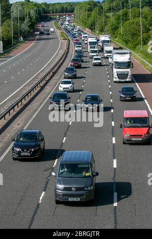 Chorley, Lancashire. 21st May, 20020 UK Weather; Heavy traffic on the M6 as the return to work picks up momentum. Congestion leads to the inevitable breakdown and mishap blocking traffic south bound.   Credit: MediaWorldImages/AlamyLiveNews Stock Photo