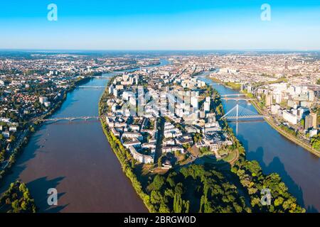 Nantes city between the branches of the Loire river aerial view in Loire-Atlantique region in France Stock Photo