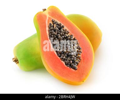 One whole multicolored papaya fruit and a half with seeds isolated over white background Stock Photo