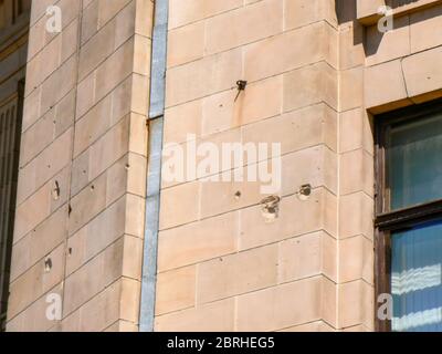 Evidence of war damage on the exterior of buildings in Riga, Latvia Stock Photo