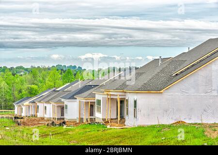 Horizontal shot of new homes under construction. Stock Photo