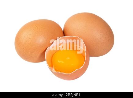 Broken chicken egg with yolk isolated on white background. Raw egg. Stock Photo