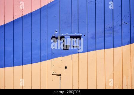 A lock on a colourful door. Stock Photo