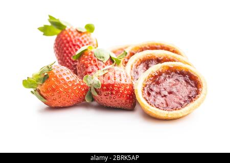 Sweet biscuits with strawberries jam and strawberries isolated on white background. Stock Photo