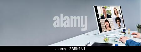 Man Working From Home Having Online Group Videoconference On Laptop Stock Photo