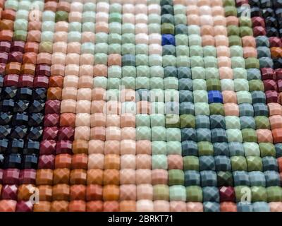 Close-up, colorful square diamond embroidery bright. Hobbies and entertainment. Stock Photo