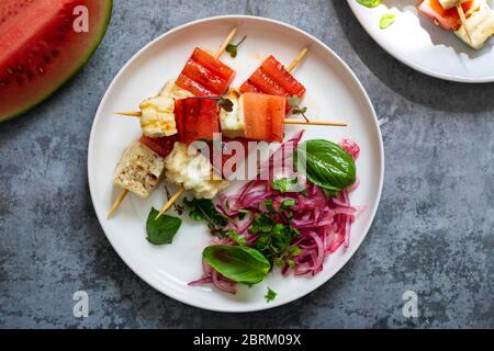 Grilled halloumi cheese and watermelon skewers Stock Photo