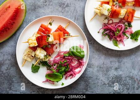Grilled halloumi cheese and watermelon skewers Stock Photo