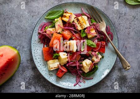 Grilled halloumi cheese and watermelon salad Stock Photo