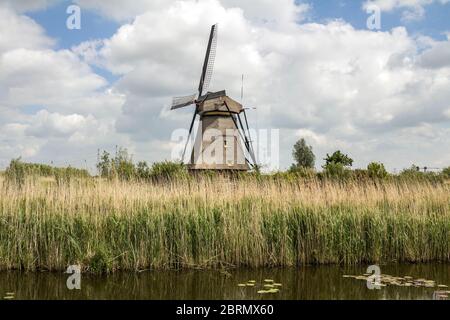 Kinderdijk, Rotterdam, NETHERLANDS: Netherlands rural lanscape with windmills at famous tourist site Kinderdijk in Holland. Old Dutch village Kinderdi Stock Photo