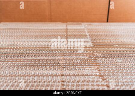 Images of corrugated cardboard sheets to stack packaging boxes, simple image without marks. Stock Photo
