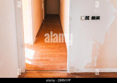 Room of a house in rehabilitation, reform of the electrical switchboards. Stock Photo