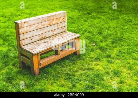 chair on green lawn Stock Photo