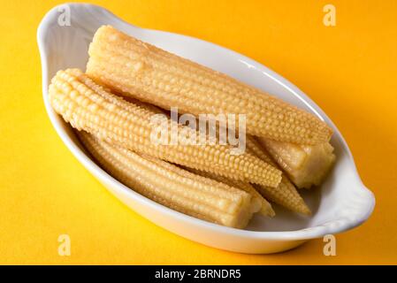 Miniature Corn on the Cob in a Bowl Stock Photo