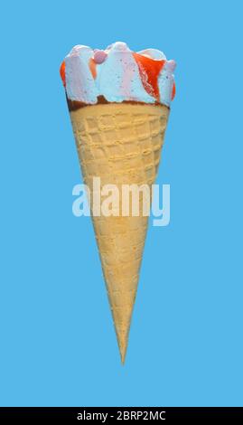 side view fresh marshmallow and raspberry flavor ice cream cone on blue background Stock Photo