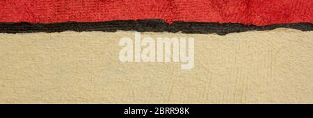 red, black and beige - abstract landscape created with colorful sheets of handmade textured paper, long web banner Stock Photo