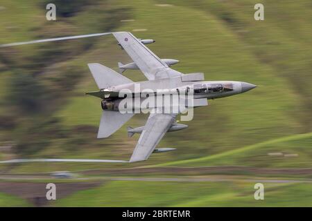 Royal Air Force (RAF)  Tornado GR4 Fighter Bomber low flying in the United Kingdom Wales, Cumbria, Scotland 25ft low and fast Stock Photo