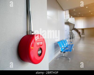 Fire alarm manual station on wall in modern office building or factory. safety concept Stock Photo