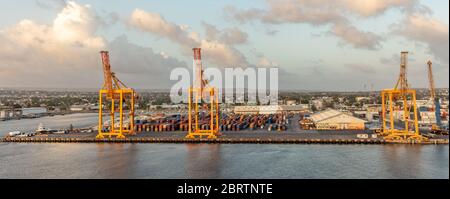 Bridgetown port with loading cranes and containers Stock Photo