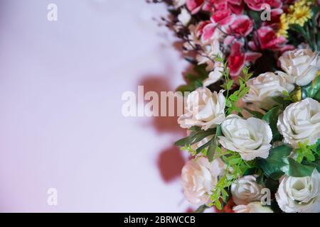 Roses Garland Artificial Silk Flowers . Seamless border with white roses. Isolated on white background. Free space for writing . Garland of Large Stock Photo
