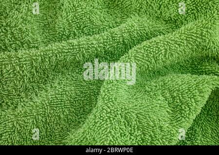 Green towel texture background. Close up. Stock Photo