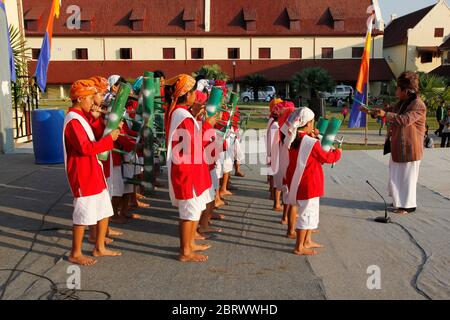 MAKASSAR - INDONESIA, 17 MAY 2012 : the appearance of Toraja children playing wind music called Passuling Stock Photo