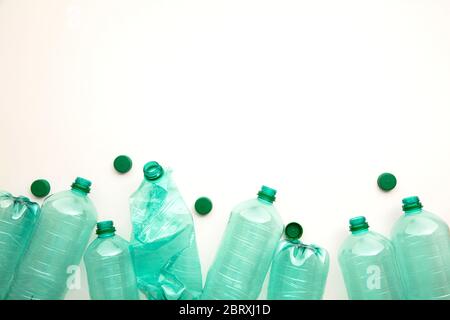 Empty green plastic waste water bottles ready to be recycled. Stock Photo