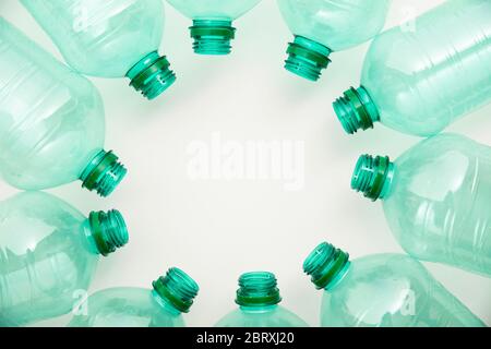 Empty green plastic waste water bottles ready to be recycled. Stock Photo