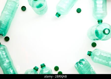 Empty green plastic waste water bottles ready to be recycled. Stock Photo