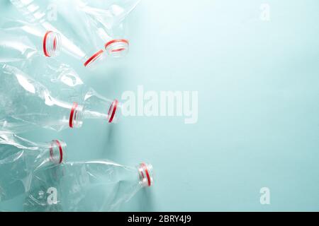 Empty crumpled plastic bottles. Ecology or recycling concept with copy space. Stock Photo