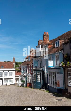 Lymington, Hampshire, England, UK. May 2020. Colourful properties on a  street in Lymington a small town in the New Forest area of southern England. Stock Photo
