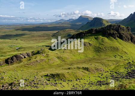 View south from The Quiraing trail, Trotternish Ridge, Isle of Skye, Scotland, UK Cnoc a' Mheirlich (266M near right) with Cleat (336M behind)  The St Stock Photo